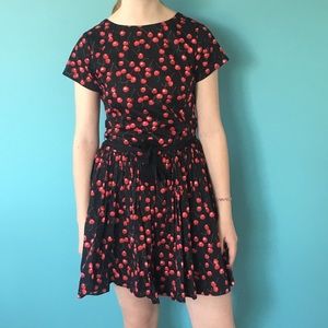 Black dress with red cherry design.
